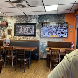 Halal House - Tv inside the diner