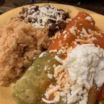 Los Chiludos - Chicken enchiladas half red half green - Mexican Near Me - Holmes Beach, Florida