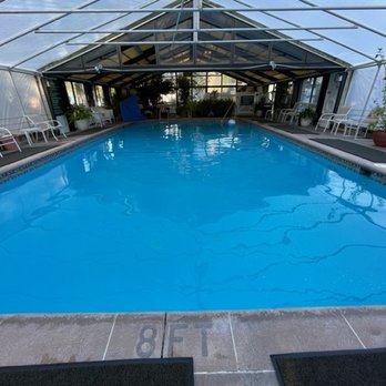 Refuge Inn - The pool - covered in colder months, open air in warmer months - Hotels Near Me - Chincoteague Island, Virginia Refuge Inn - The pool - covered in colder months, open air in warmer months - Hotels Near Me - Chincoteague Island, Virginia