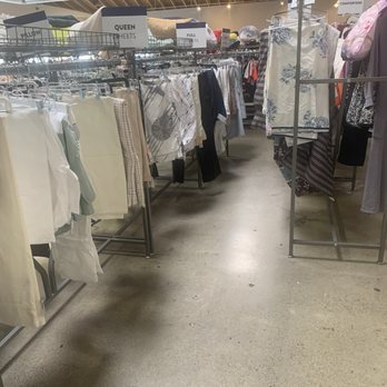 Goodwill Store & Donation Center - Long view of some of the clothing racks. - Thrift Stores Near Me - San Mateo, California