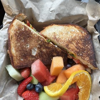 Cafe Elysa - Turkey sandwich with a side of fruit. - Coffee & Tea Near Me - Carlsbad, California