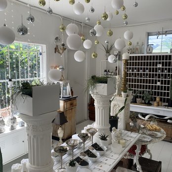 Remedies Parlor - a white room with christmas decorations - Jewelry Near Me - Fort Myers, Florida