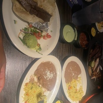 Gringo's Mexican Kitchen - What's left of the steak taco with beans and rice! Delicious!!!!! - Tex-Mex Near Me - Katy, Texas Gringo's Mexican Kitchen - What's left of the steak taco with beans and rice! Delicious!!!!! - Tex-Mex Near Me - Katy, Texas