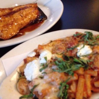 Wildfire - Front: Gluten-free vegetarian penne & wood roasted veggies Back: Gluten-free cedar-planked salmon - Steakhouses Near Me - Oak Brook, Illinois Wildfire - Front: Gluten-free vegetarian penne & wood roasted veggies Back: Gluten-free cedar-planked salmon - Steakhouses Near Me - Oak Brook, Illinois