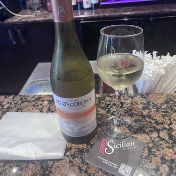 Sicilian Oven - Dandy wine, 1/2 off bottle on my carry out visit, so I had couple glasses before taking dinner home! - Pizza Near Me - Plantation, Florida