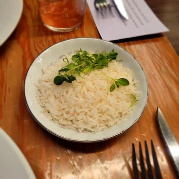 Frenchish - a plate of rice and a glass of water - French Near Me - Albuquerque, New Mexico