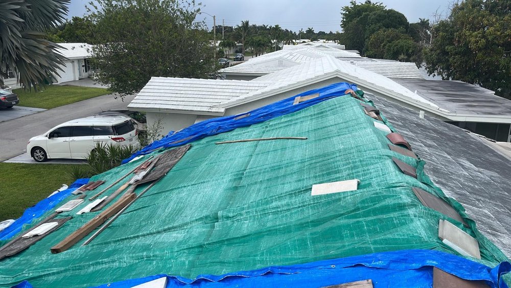 Slide of Red Apple Roofing