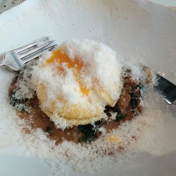 ABC Kitchen - Ricotta and farm egg ravioli over pork ragu, cut open - Breakfast & Brunch Near Me - New York, New York