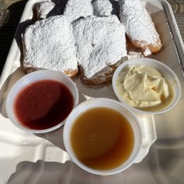 1/2 dozen beignets and three dippers