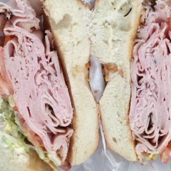 Hand Rolled Bagels - Garlic bagel with turkey, lettuce, onion, tomato w/ mayo! Sooooo goood! - Bagels Near Me - New Hyde Park, New York Hand Rolled Bagels - Garlic bagel with turkey, lettuce, onion, tomato w/ mayo! Sooooo goood! - Bagels Near Me - New Hyde Park, New York