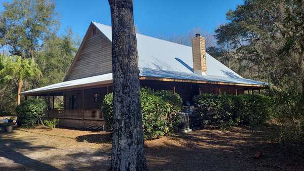 Roof Replacement - This metal roof had been leaking since it was installed 20 years ago. We removed it, replaced all the rotted wood, and properly installed a new roof!
