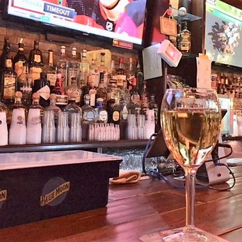 Lilly's of Long Beach - Birthday glass of pretty good house chardonnay - Sports Bars Near Me - Long Beach, New York
