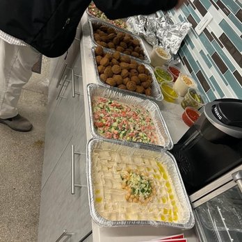 Baba’s Cuisine - a man preparing food - Pop-Up Restaurants Near Me - Long Beach, California