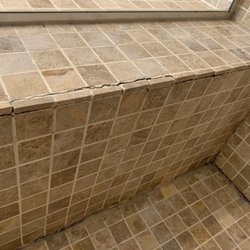 Grout Experts - Before of cracked grout on shower ledge.