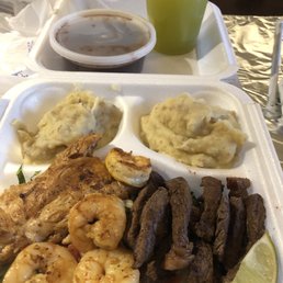 Samba Plate with double mashed potatoes, chicken, shrimp, steak over a salad. Black beans and pineapple mint drink