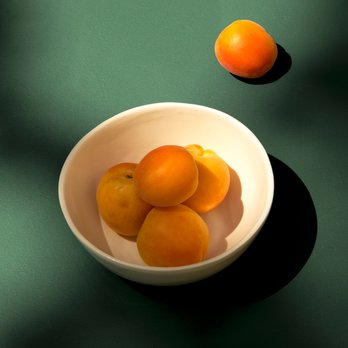 Stoke Market - a bowl of apricots on a table - Grocery Near Me - Kimberley, British Columbia Stoke Market - a bowl of apricots on a table - Grocery Near Me - Kimberley, British Columbia