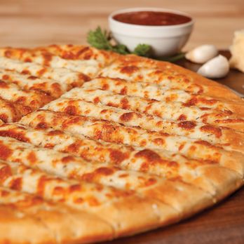 Godfather's Pizza - Cheesestix - the perfect side dish to accompany your pizza, lots of cheese and sprinkled with our delicious "fairy dust." - Italian Near Me - Muscatine, Iowa Godfather's Pizza - Cheesestix - the perfect side dish to accompany your pizza, lots of cheese and sprinkled with our delicious "fairy dust." - Italian Near Me - Muscatine, Iowa