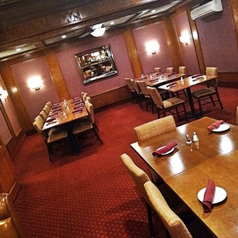 Sibley Gardens - a dining room with tables and chairs - Italian Near Me - Trenton, Michigan Sibley Gardens - a dining room with tables and chairs - Italian Near Me - Trenton, Michigan