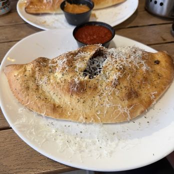 Sauce on the Side - Figgy Piggy calzone - Italian Near Me - Chesterfield, Missouri Sauce on the Side - Figgy Piggy calzone - Italian Near Me - Chesterfield, Missouri