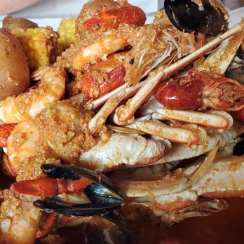 Crab N Spice - Crab legs, shrimp, mussels, crayfish, corns, potatoes, quail eggs on mild garlic butter sauce. - Seafood Near Me - Carson, California Crab N Spice - Crab legs, shrimp, mussels, crayfish, corns, potatoes, quail eggs on mild garlic butter sauce. - Seafood Near Me - Carson, California