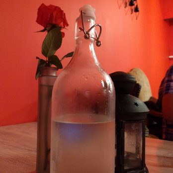 Asian Thai Kitchen 2 - Cute water bottle and decor on the table - Thai Near Me - Miami, Florida Asian Thai Kitchen 2 - Cute water bottle and decor on the table - Thai Near Me - Miami, Florida
