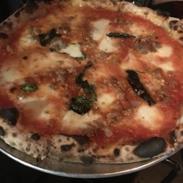 Margarita pizza with crumbled sausage