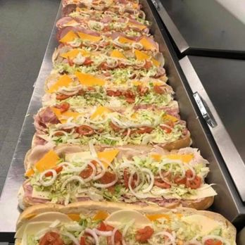 Fatzo's Sub & Pizza Shop - a long line of subs - Pizza Near Me - Two Rivers, Wisconsin