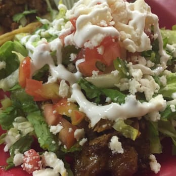 El Limon - Malvern - Carnitas tostada best enjoyed with a side of mole - Mexican Near Me - Malvern, Pennsylvania
