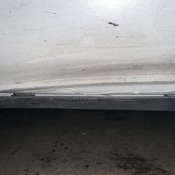 Magic Dent Removal - rocker panel - before - Mobile Dent Repair Near Me