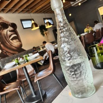 Rocca Pizzeria - Mural of Ray Charles (no comments on that water bottle) - Italian Near Me - Baton Rouge, Louisiana Rocca Pizzeria - Mural of Ray Charles (no comments on that water bottle) - Italian Near Me - Baton Rouge, Louisiana
