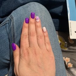 Hi Nails - When I told him it was wrong he kept going this hand was supposed to have the heart in the middle and the T on my ring finger