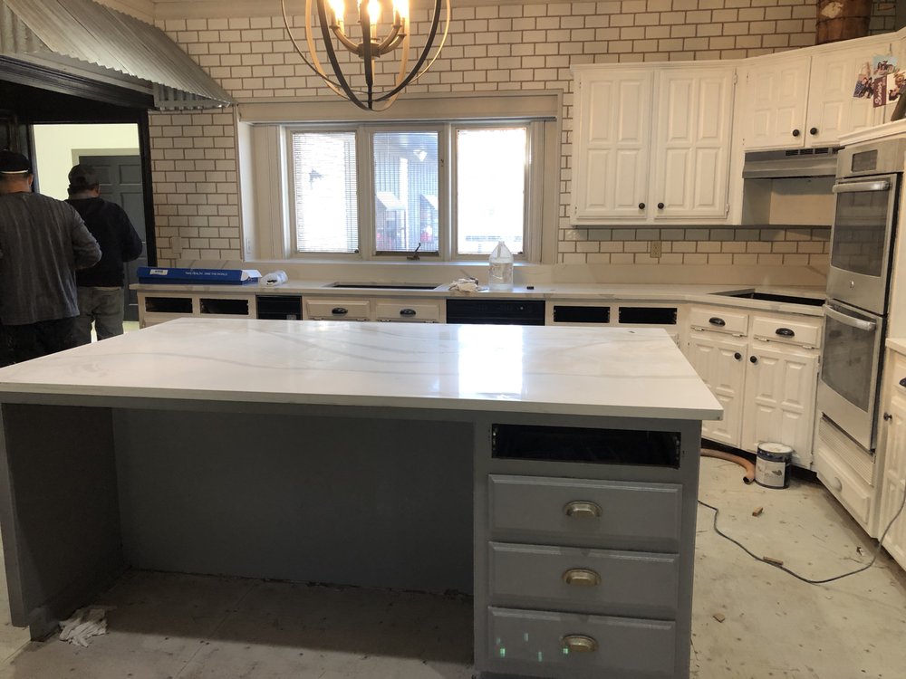 Slide of DNA Roofing & Construction