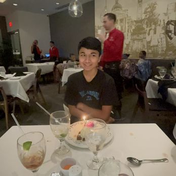 Terra Gaucha - Bday boy with his bday dessert - Steakhouses Near Me - Indianapolis, Indiana Terra Gaucha - Bday boy with his bday dessert - Steakhouses Near Me - Indianapolis, Indiana
