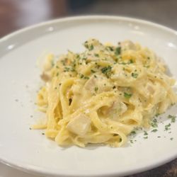 The Source Plates and Pours - Pasta chicken Alfredo