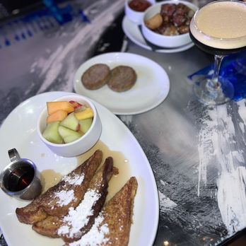 Society - French toast, sausage and seasonal potatoes with an espresso martini - New American Near Me - Kansas City, Missouri Society - French toast, sausage and seasonal potatoes with an espresso martini - New American Near Me - Kansas City, Missouri