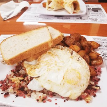 Hobos Gourmet Kitchen - Over medium eggs w the MOST DELISH corned beef hash ever!! Sourdough toast and yummy, crispy homefry potatoes! - Breakfast & Brunch Near Me - North Palm Beach, Florida Hobos Gourmet Kitchen - Over medium eggs w the MOST DELISH corned beef hash ever!! Sourdough toast and yummy, crispy homefry potatoes! - Breakfast & Brunch Near Me - North Palm Beach, Florida