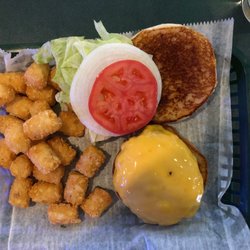 Duffy's Den - 1/3rd lb. burger. Tots are $2 extra.