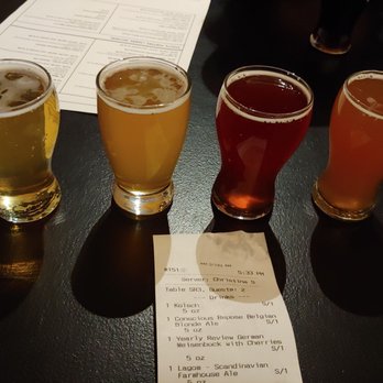 Dead Low Brewing - Left to right-kolsch, belgian blonde ale, weisenbock with cherries, farmhouse ale. - Brewpubs Near Me - Cincinnati, Ohio