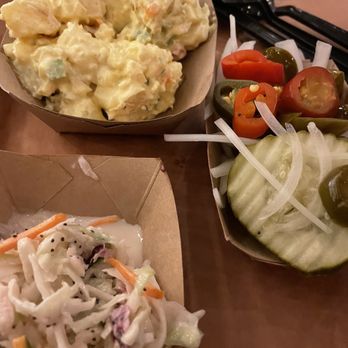 Caldwell County BBQ - All the sides - coleslaw, potato salad, pickles and peppers - Barbeque Near Me - Gilbert, Arizona