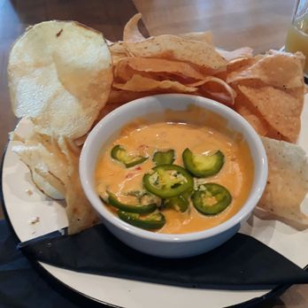 Maple Landing - Queso, tortilla chips, house made potato chips - Barbeque Near Me - Dallas, Texas