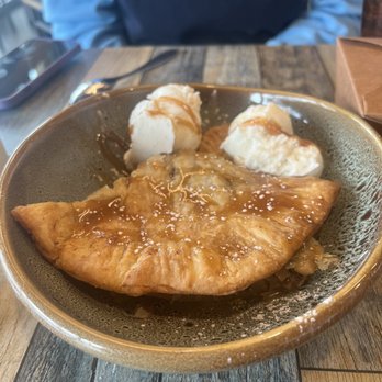 Sixty Six Acres - Apple pie empanada with ice cream and green Chile and caramel - Cocktail Bars Near Me - Albuquerque, New Mexico Sixty Six Acres - Apple pie empanada with ice cream and green Chile and caramel - Cocktail Bars Near Me - Albuquerque, New Mexico