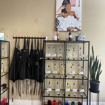 Wick and Sip Candle Lounge - Scent wall and aprons - Candle Stores Near Me - Richmond, Virginia Wick and Sip Candle Lounge - Scent wall and aprons - Candle Stores Near Me - Richmond, Virginia