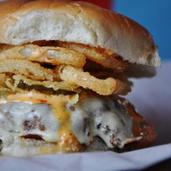 Pinky's Westside Grill - White Trash Burger:
5oz Beef Patty
Onion Straws, Fried Pickles, Spicy Ranch, Provolone #pinkyswestsidegrill