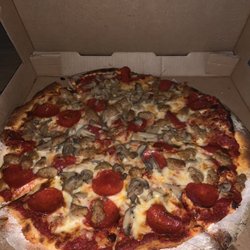 Matolis Pizza and Subs - Mushroom, pepperoni and Italian sausage.