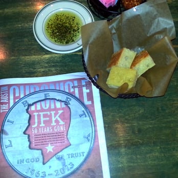 Mandola's Italian - My bread was there before I even sat down! And someone thoughtfully left a Chron behind. - Italian Near Me - Austin, Texas