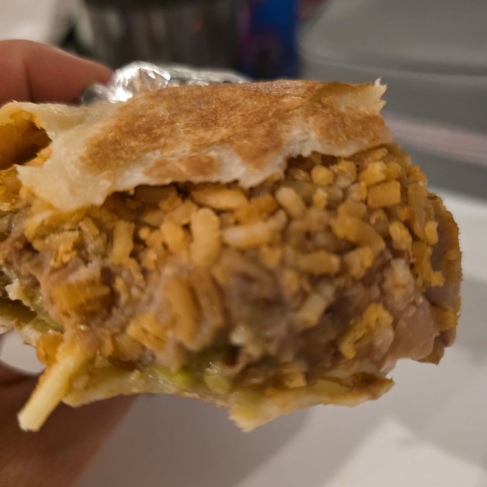 Rice and beans burrito...except I ordered carne asada Rice and beans burrito...except I ordered carne asada