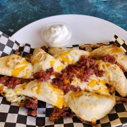 Kokanee Grill - Pub perogies $13.00 in 2025.