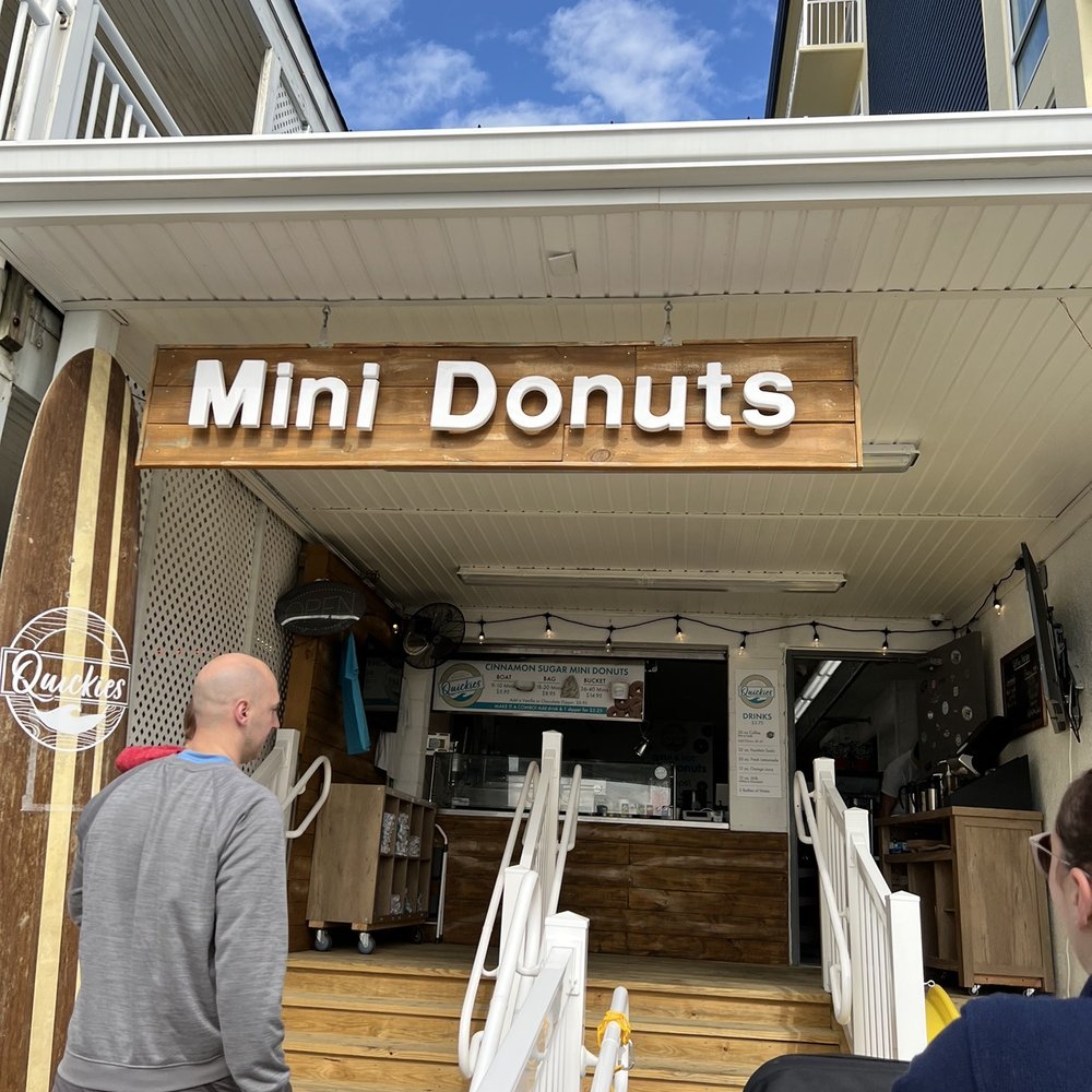 Quickies Mini Donuts & Coffee - a man and a woman - Donuts Near Me - Ocean City, Maryland Quickies Mini Donuts & Coffee - a man and a woman - Donuts Near Me - Ocean City, Maryland