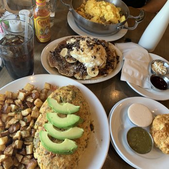 Buttermilk - The Ranch omelet with sauces on the side, biscuit, Chicken Fried Chicken Scramble, Banoffee pancake and cold brew. - Coffee & Tea Near Me - Naperville, Illinois