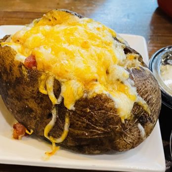 Saltwater Fishery - Loaded baked potato - Seafood Near Me - Dublin, Georgia Saltwater Fishery - Loaded baked potato - Seafood Near Me - Dublin, Georgia